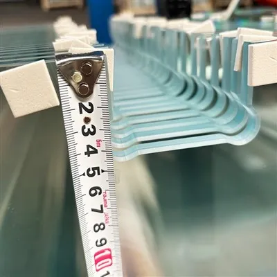 Hvor dyrt er herdet glass for en dusj?